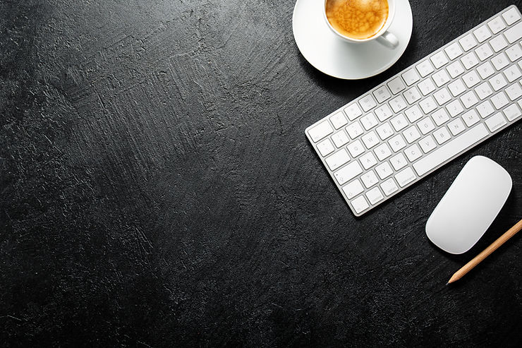 Image of keyboard and coffee with black background